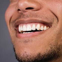 man smile teeth