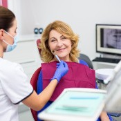 Smiling patient in the dental chair